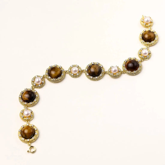 Gold-plated link bracelet with alternating brown tiger&