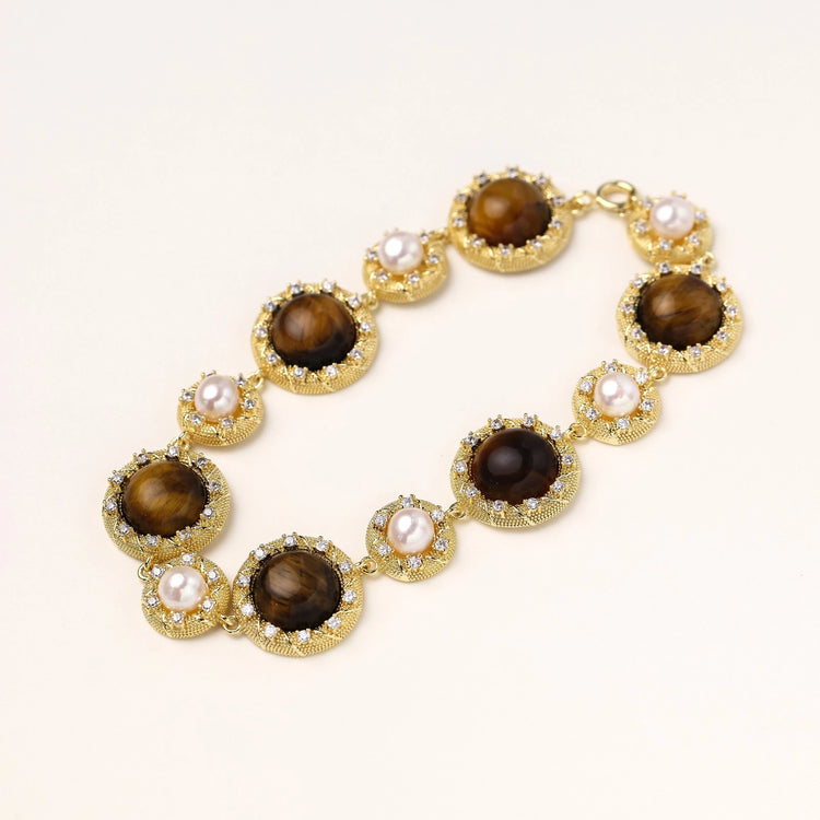 Gold-plated link bracelet with alternating brown tiger&